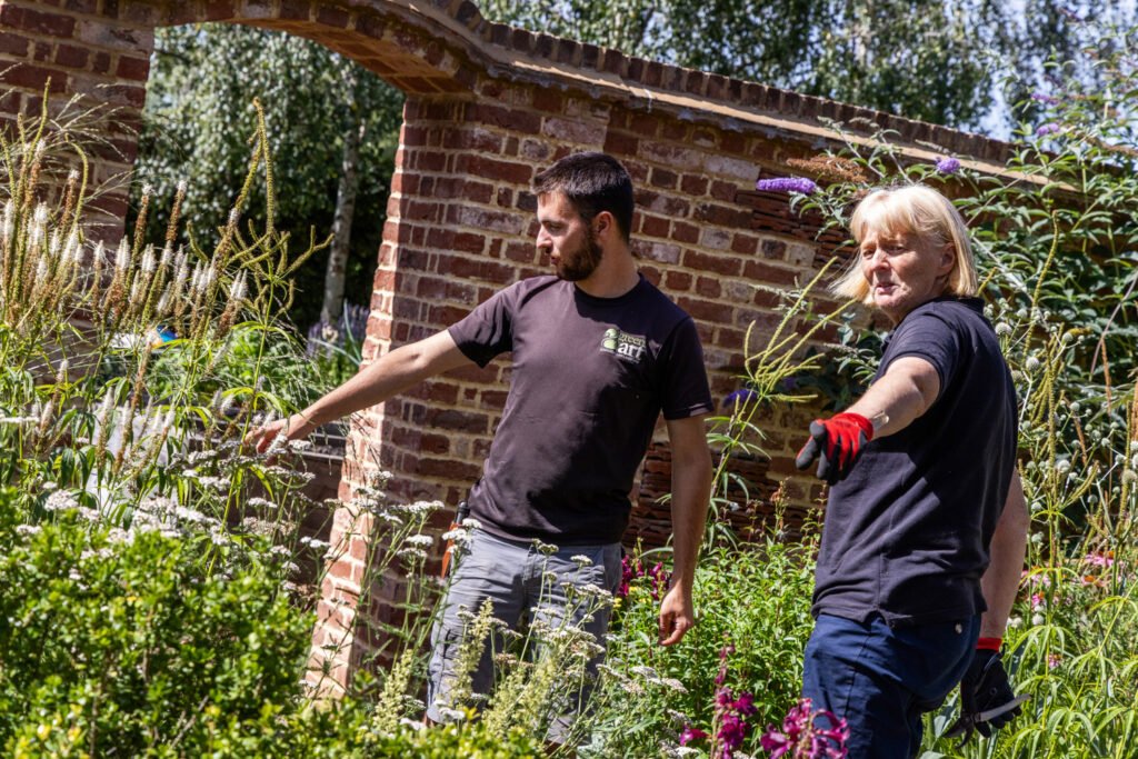 Sam and Toby pointing at plants